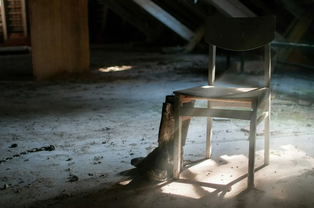 dusty chair in empty room