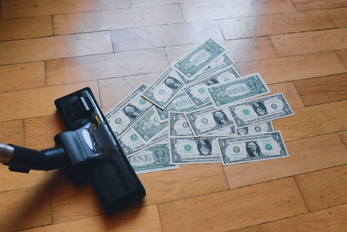 vacuuming money